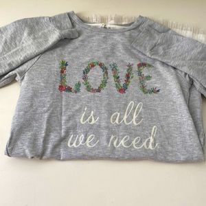 Peek dress love is all we need on the front size 10